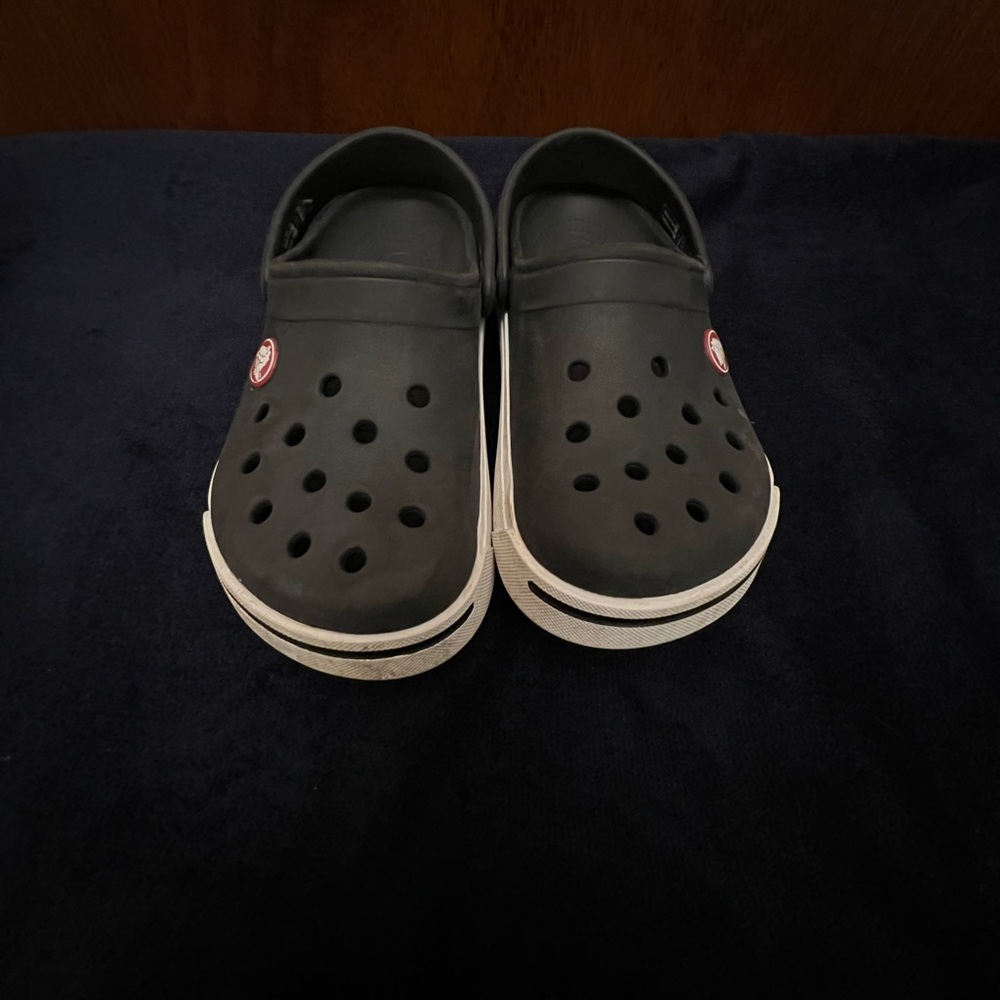 Crocs size 12/13 black and white clogs(2 pair, sold separate)